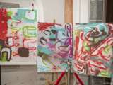 Drie kunstwerken tentoonstelling in de kerk.
